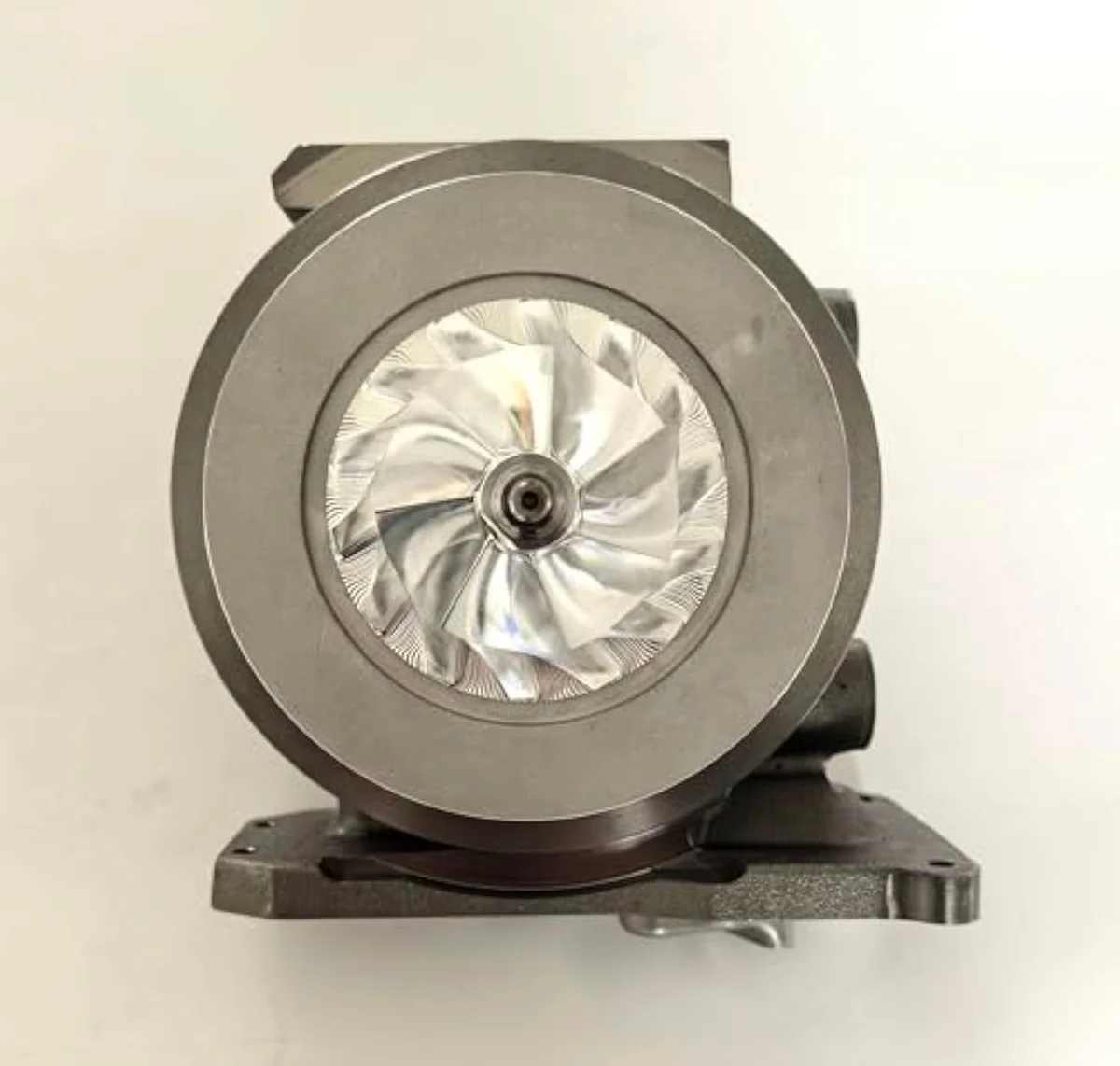 Holset HE351VE cartridge CHRA — compressor wheel, bearing housing, and turbine shaft assembly that the cartridge layer replaces in the Cummins 6.7L diagnostic decision tree.